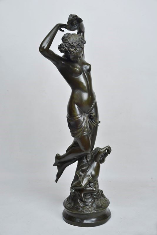 Nudo femminile con fiori e putto