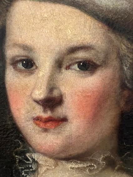 Ritratto di giovane donna con cesto di fiori