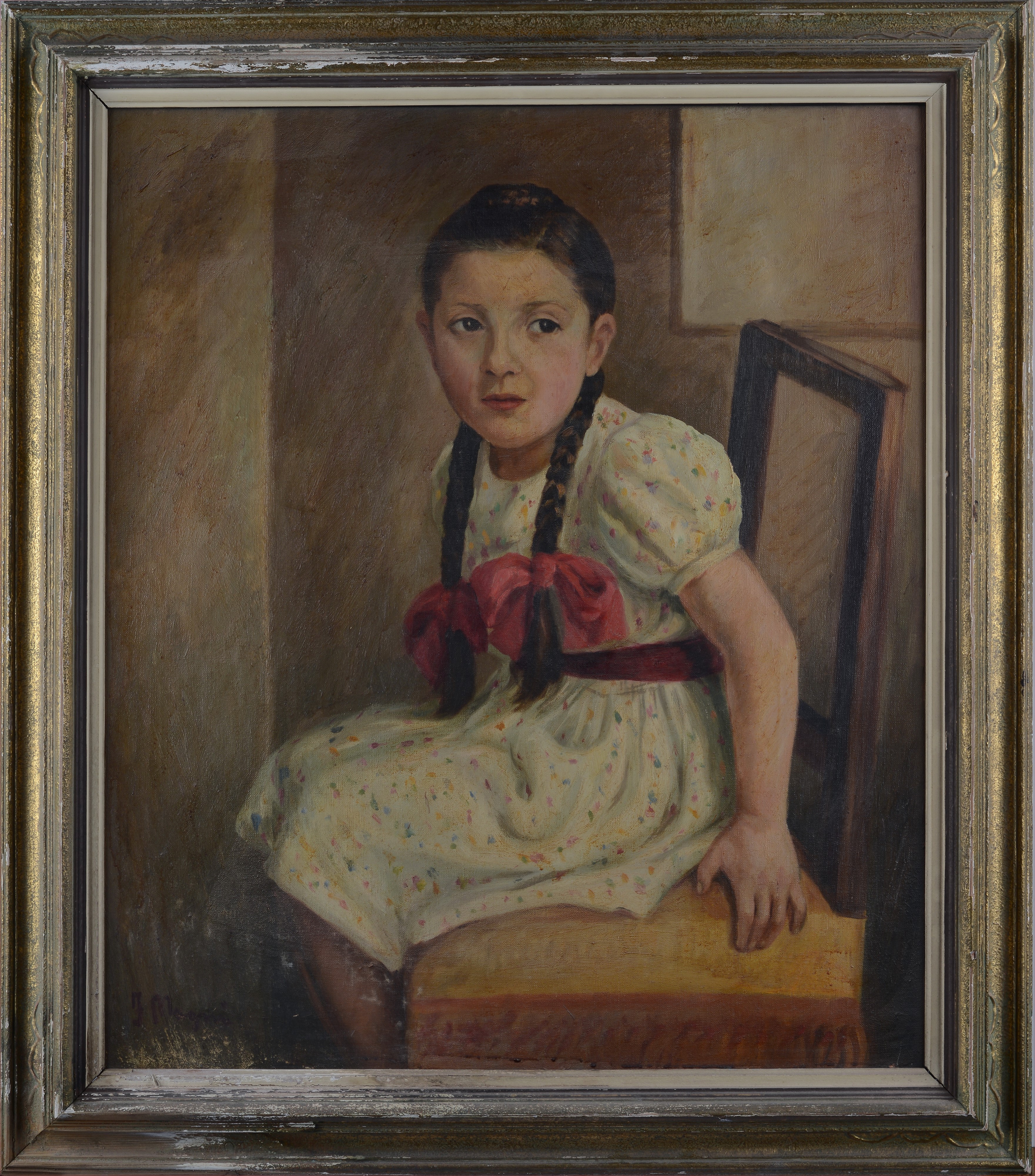 Ritratto di bambina sulla sedia