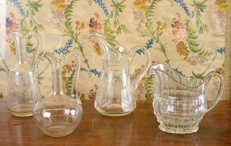 Quattro brocche in vetro