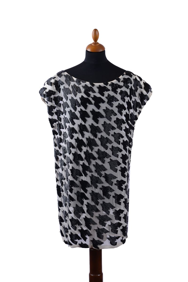 Abito in seta bianca