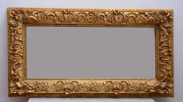 Specchiera con cornice in legno e pastiglia, alcuni difetti, XX secolo, cm 56x104