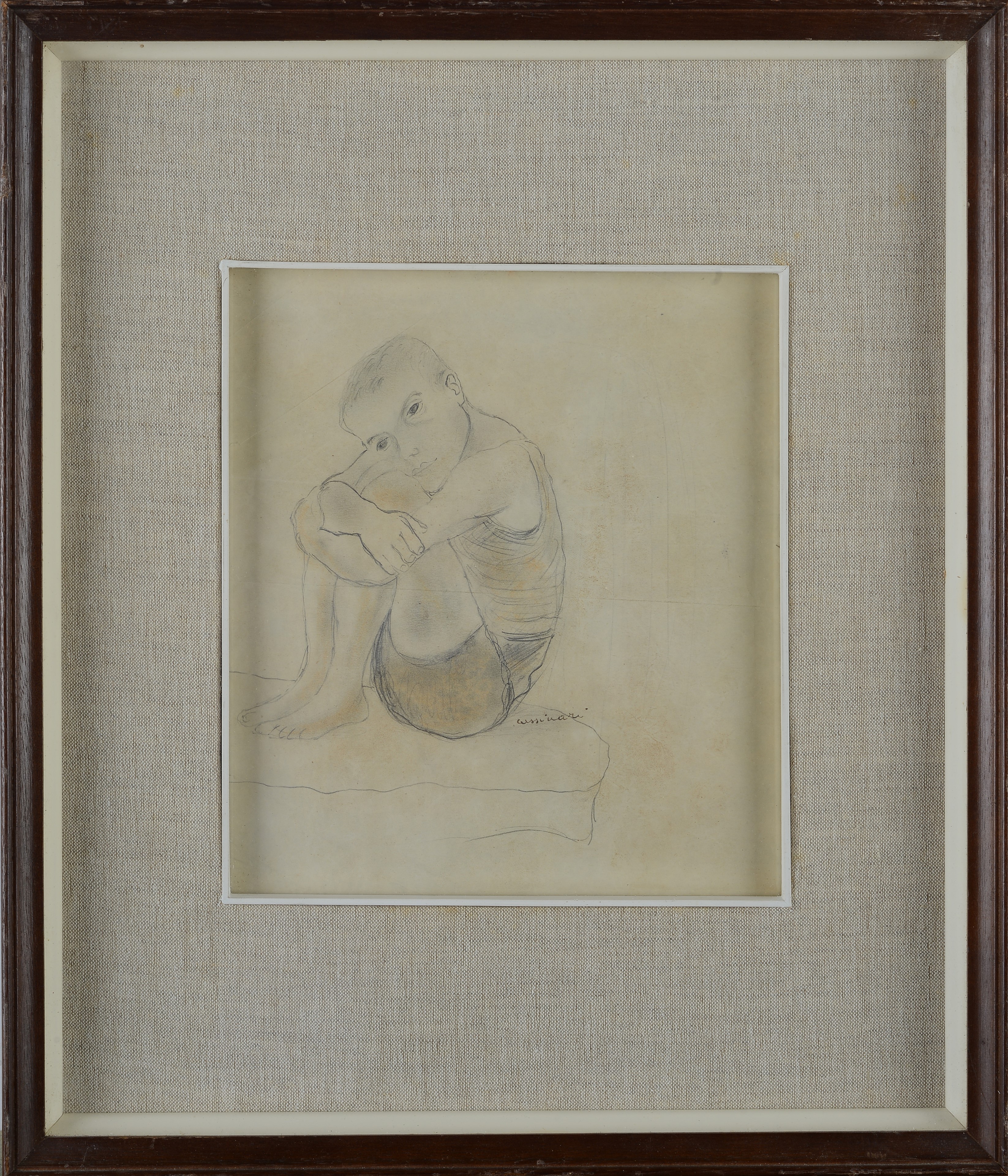 Bambino accovacciato