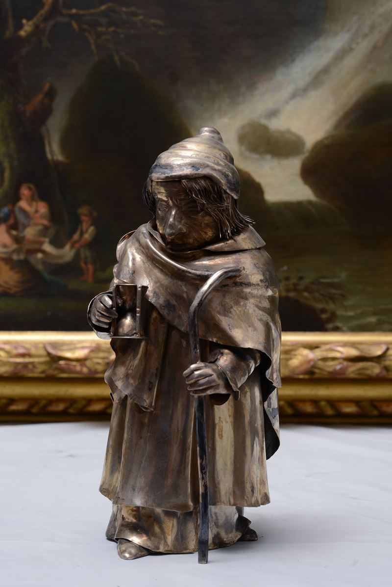 Figura con Bastone e Clessidra