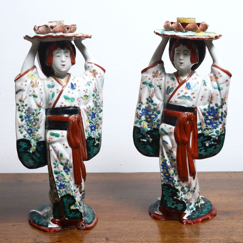 Coppia di sculturine portacandele