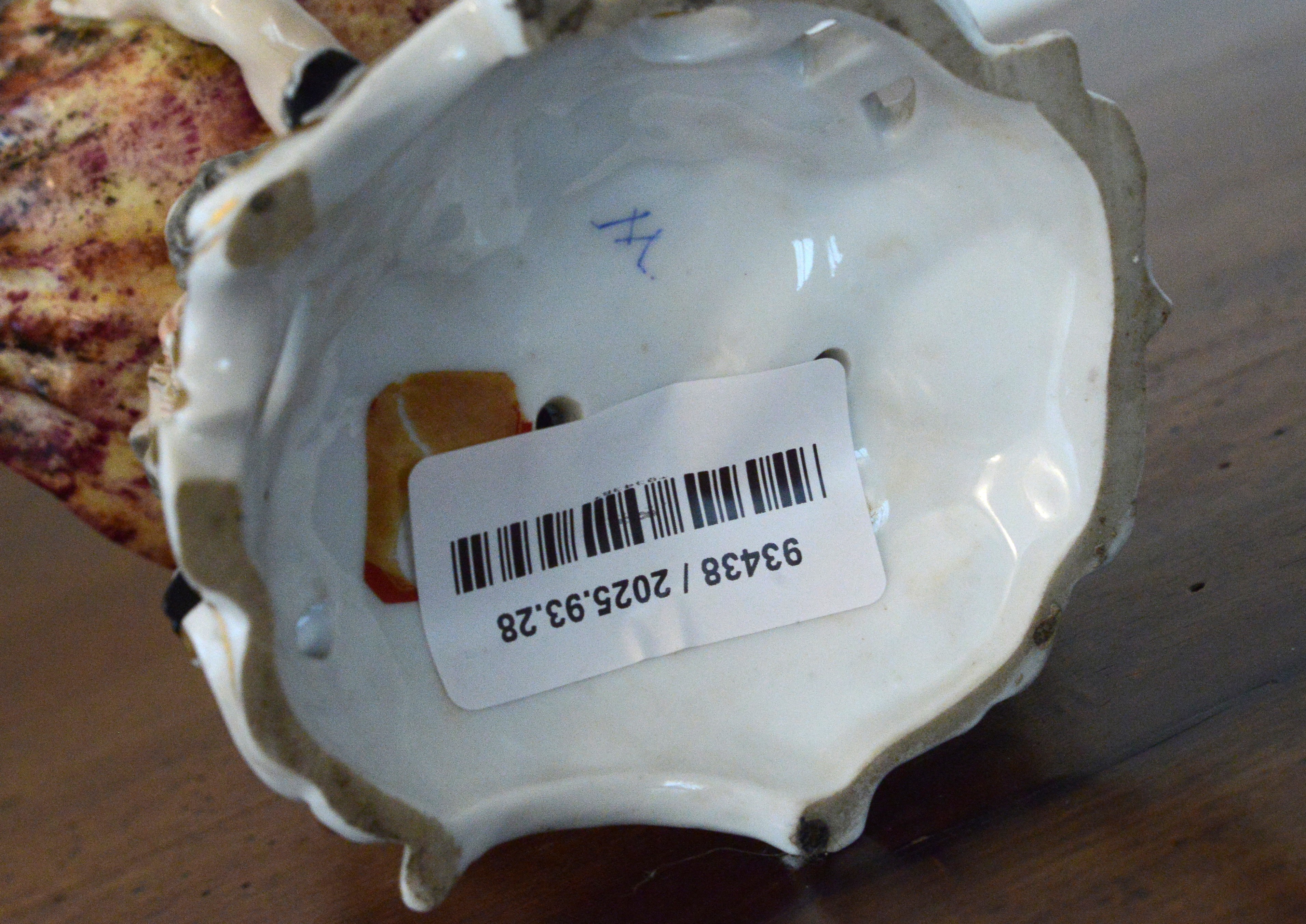 Fauno che sostiene conchiglia, con putto