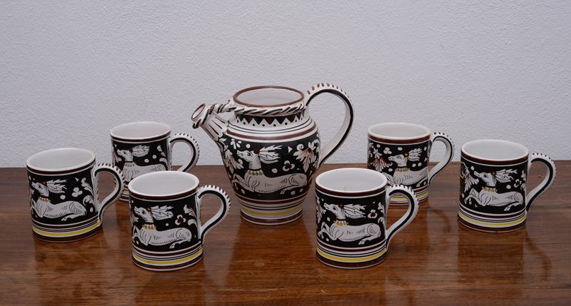 Una brocca e sei tazze