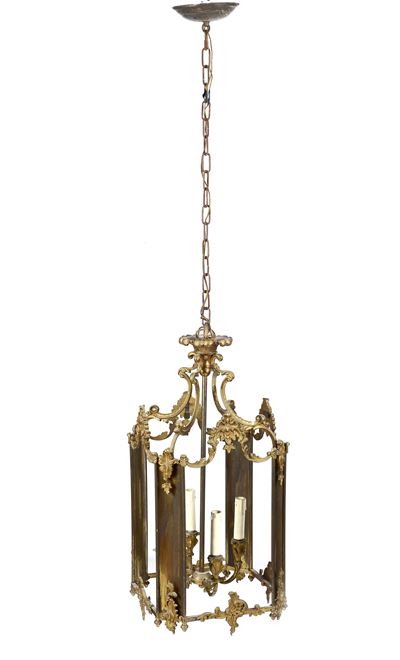 Lampadario in bronzo dorato a quattro luci