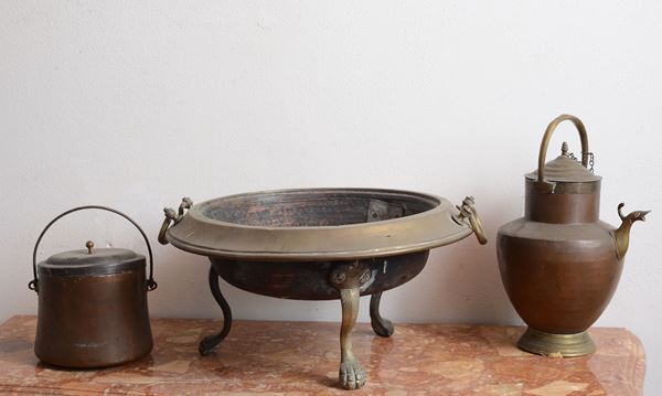 Un versatoio, un portalatte e un bracere