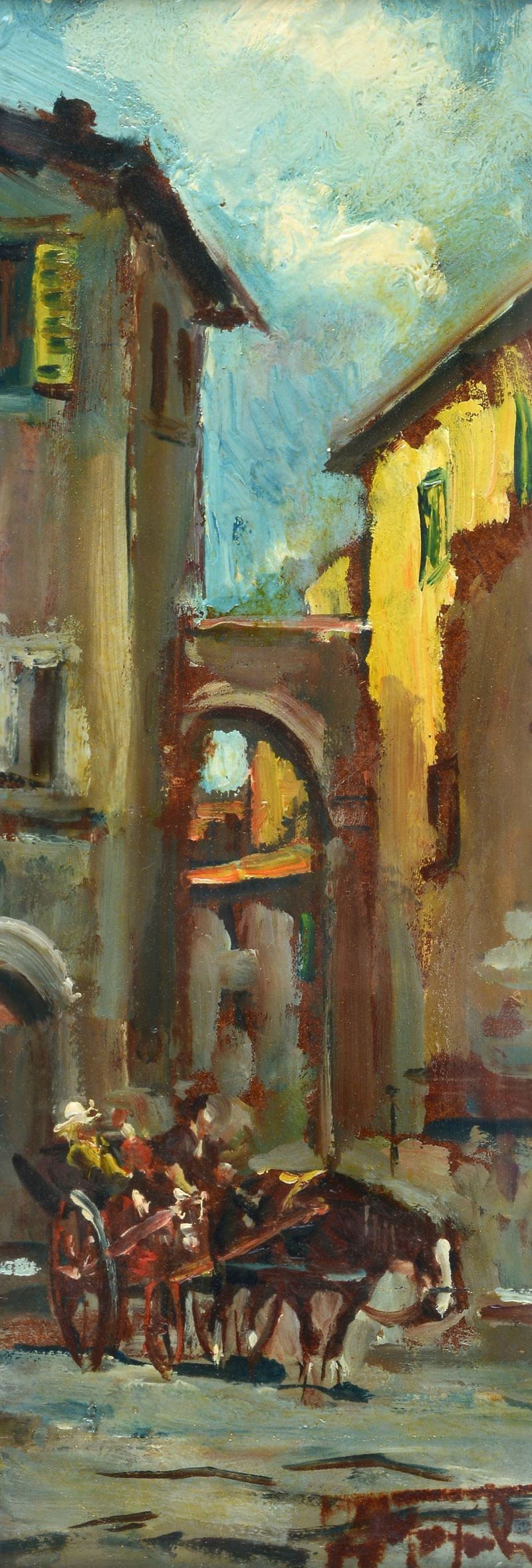 Scorcio di paese con carrozzella